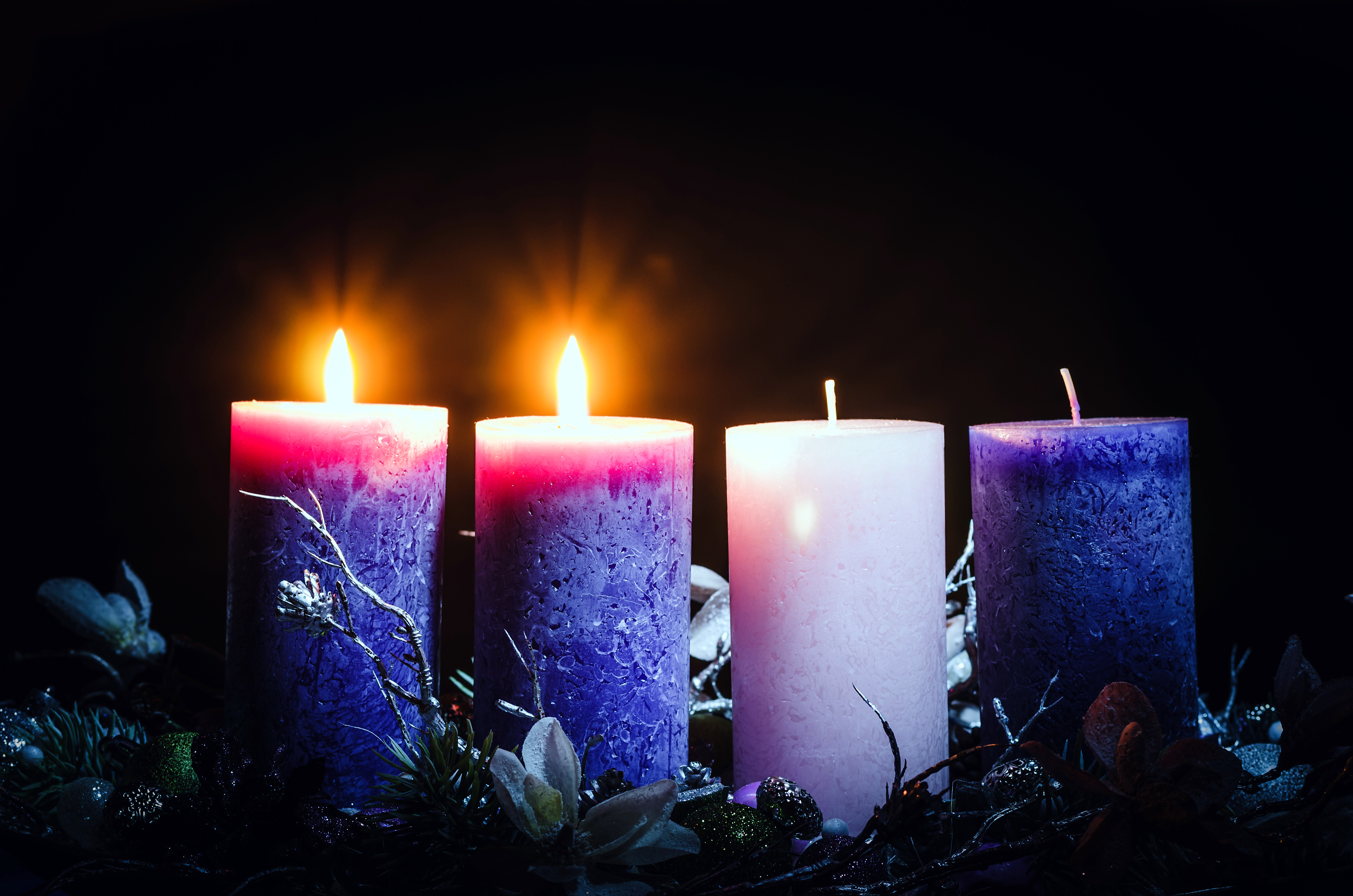 photo of 2 lit purple Advent Candles