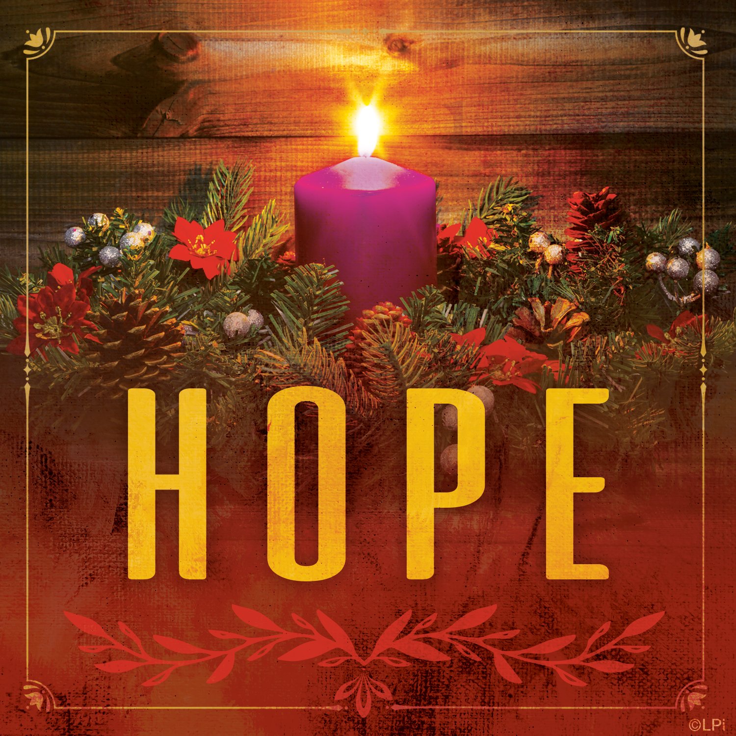 Photo of the first lit Advent candle with the word HOPE