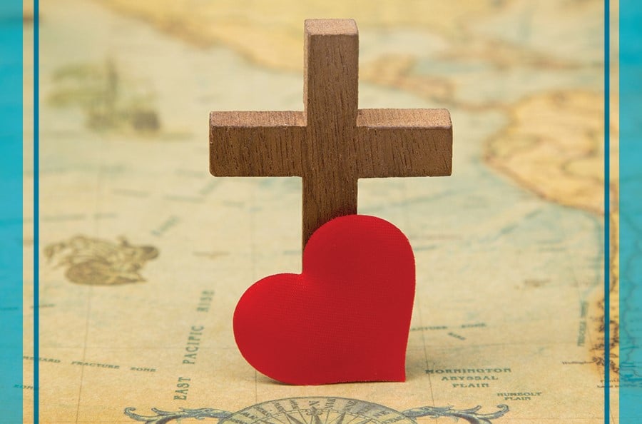 Depiction of the cross and heart on a world map