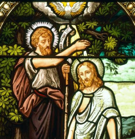 Photo of stained glass window depicting the baptism of Christ