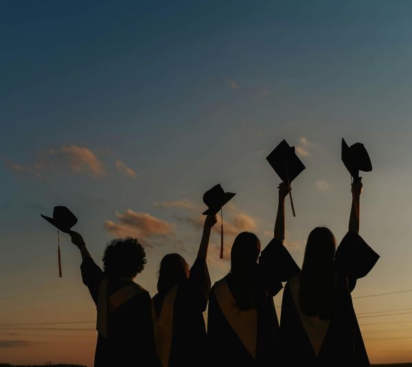 silhouette of graduating students