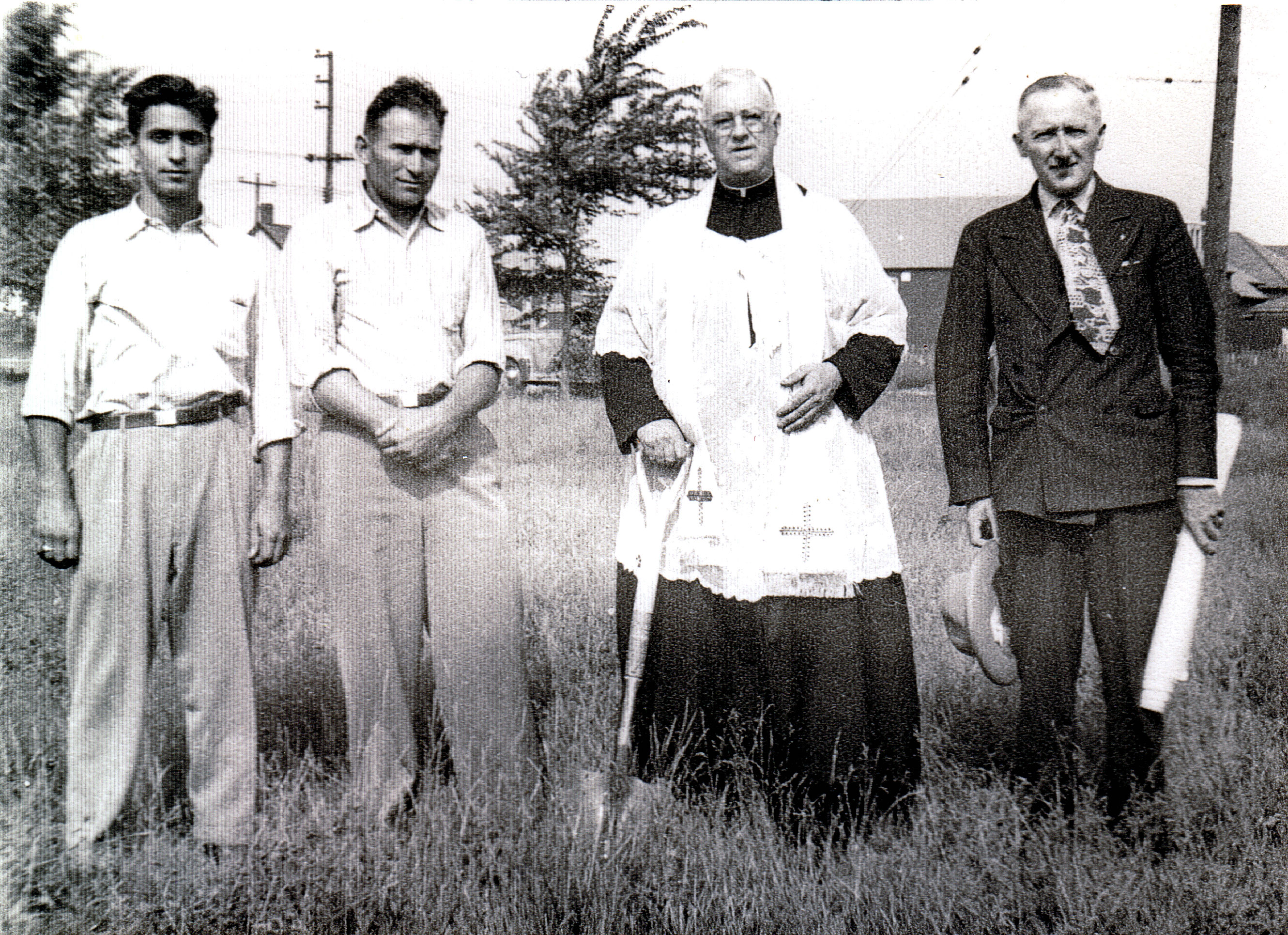 Photo of Father Miller and others at the breaking ground ceremony September 10, 1947