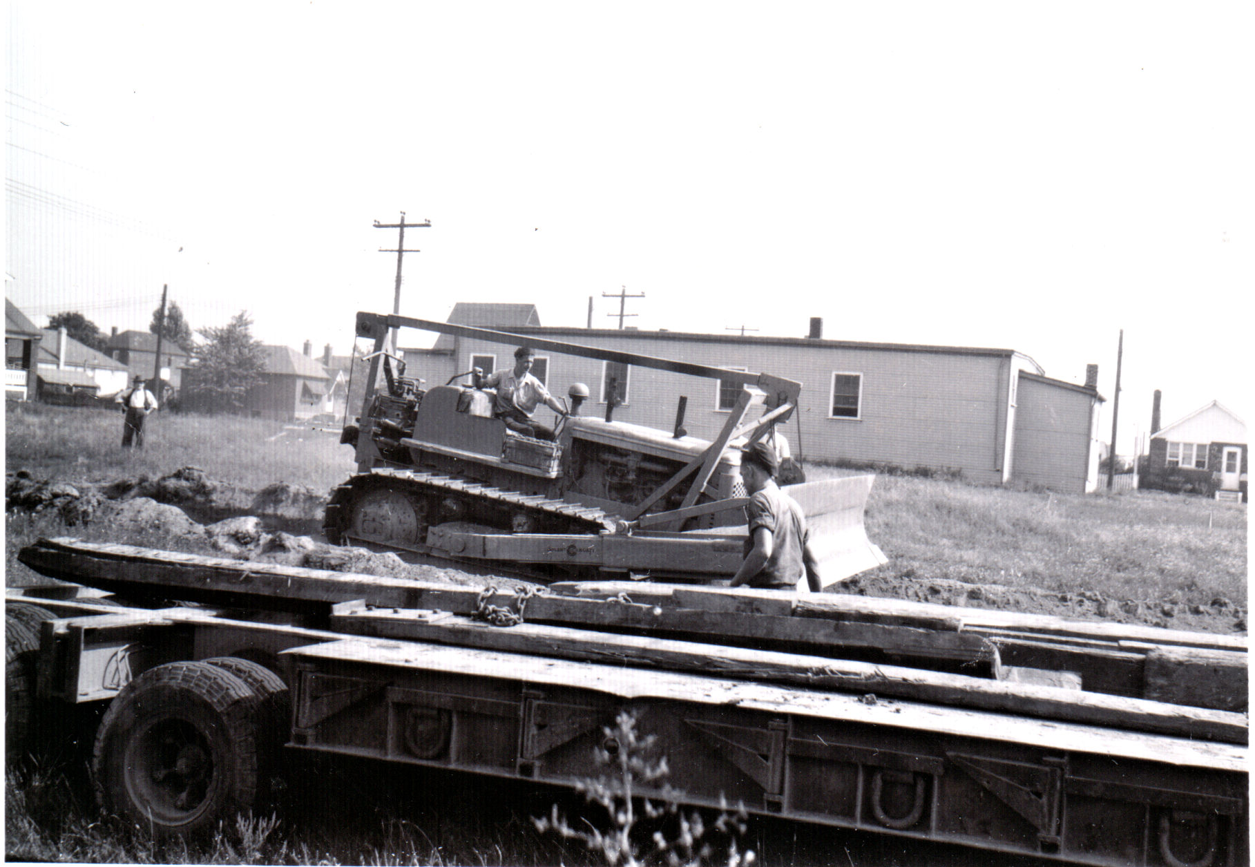 Photo of the bulldozer at the start of the excavation of the new church