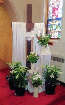 Photo of large cross draped in white