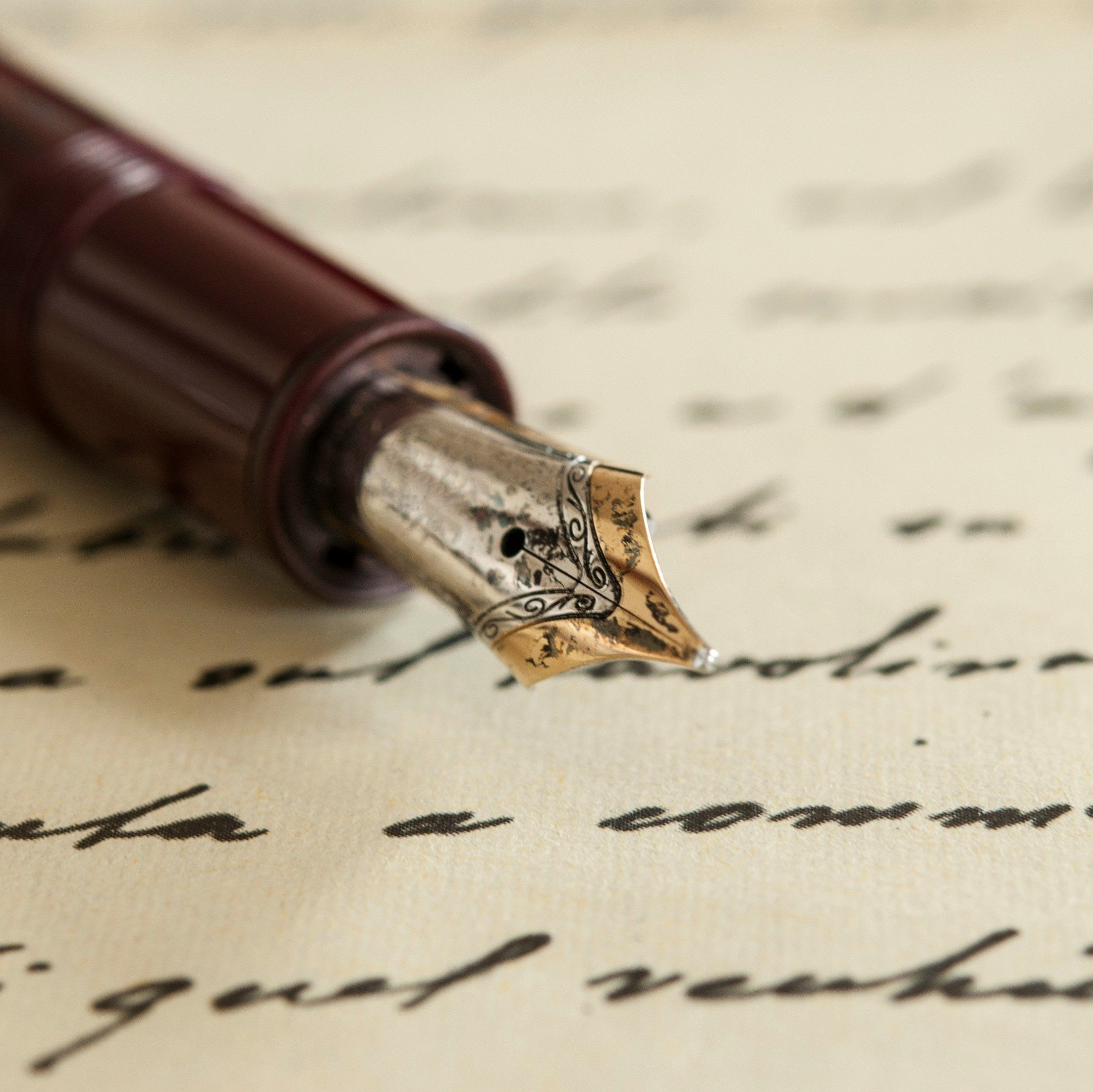 Photo of a fountain pen and letter