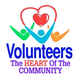 Three stylized figures holding up a heart with the text - Volunteers, the heart of the community