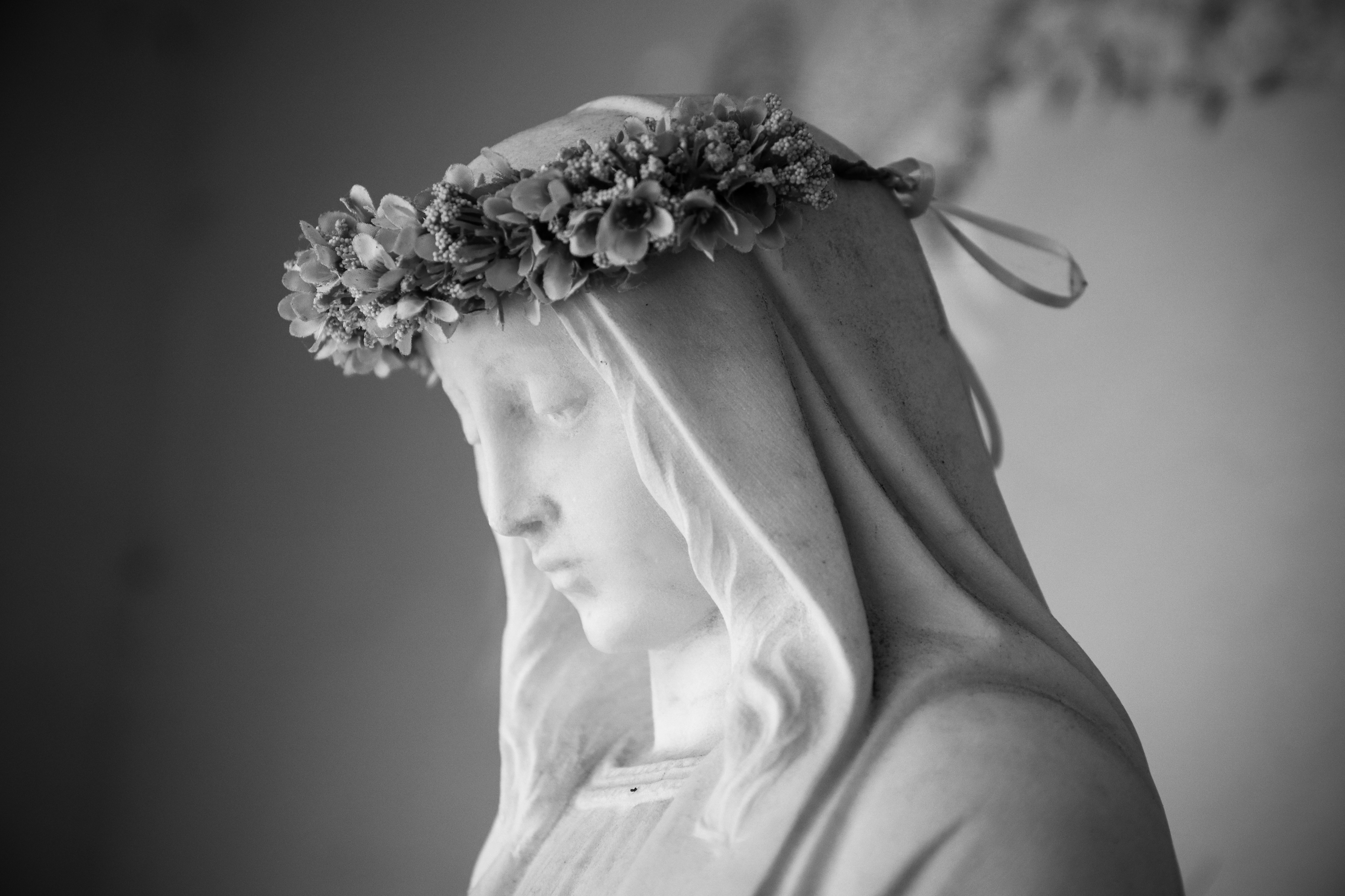 Statue of Our Lady with a crown of flowers