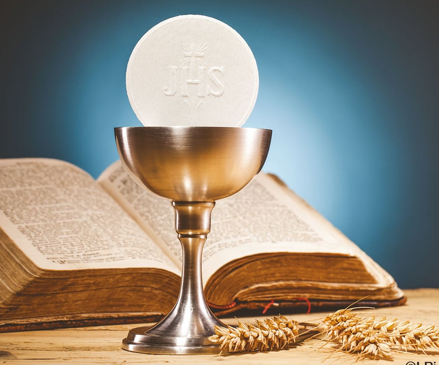 photo of a chalice with the Eucharist