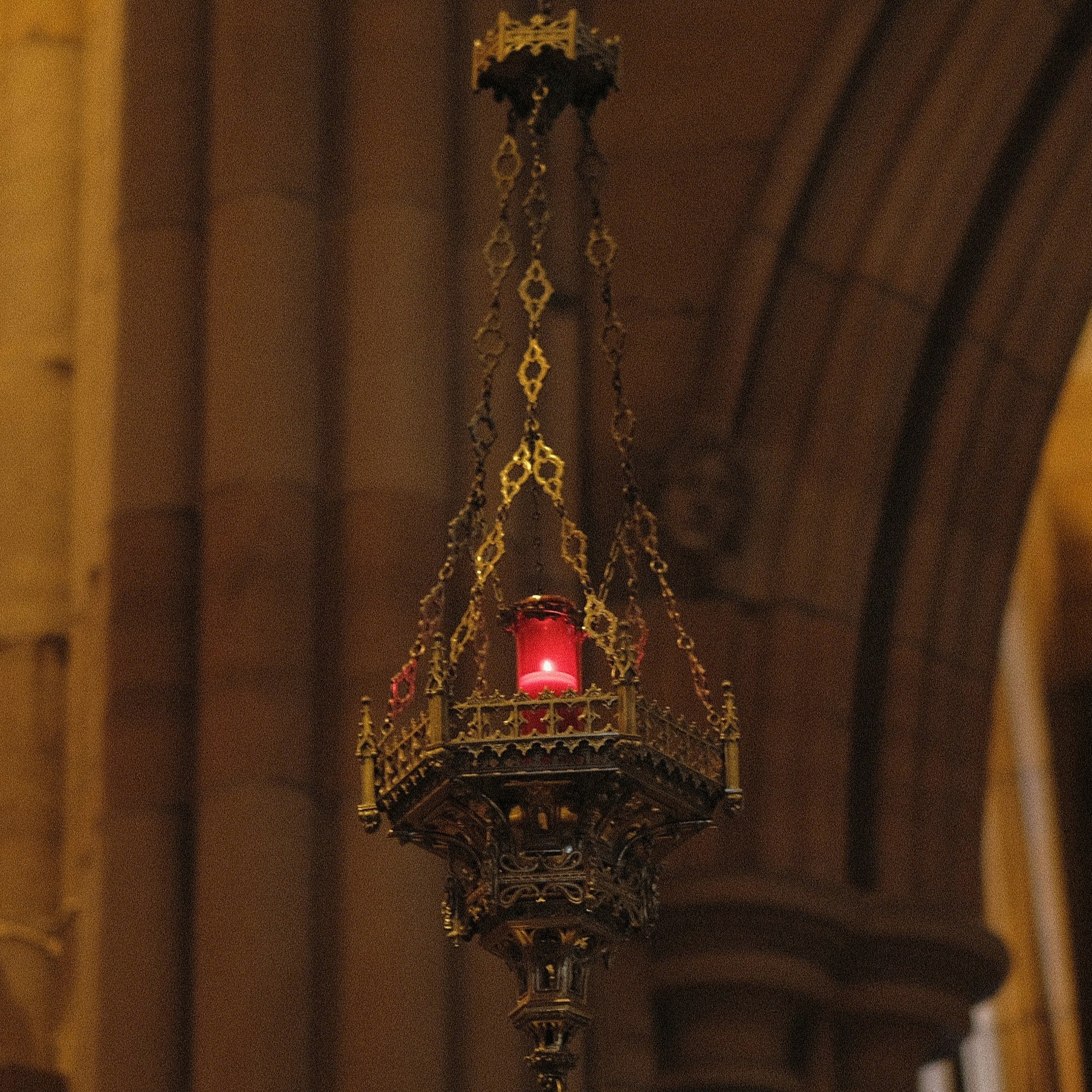 Photo of a lit sanctuary lamp