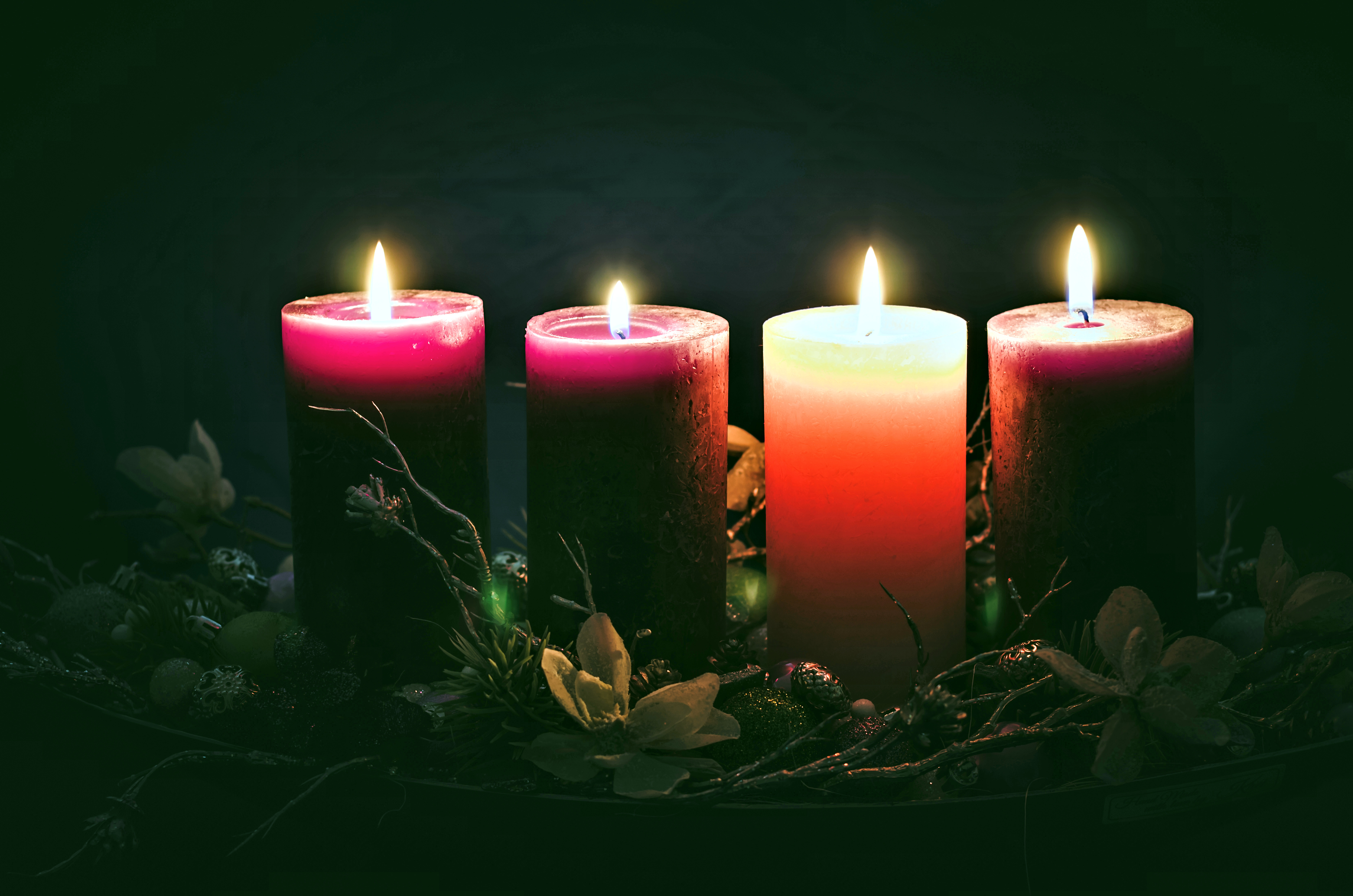Four lit Advent candles